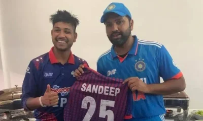 Rohit Sharma signing autograph for Sandeep Lamichhane