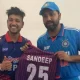 Rohit Sharma signing autograph for Sandeep Lamichhane
