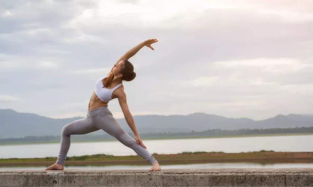woman doing yoga fitness exercise