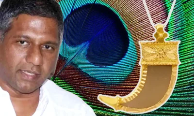Arvind Bellada infront of Peacock feather and Tiger Nail