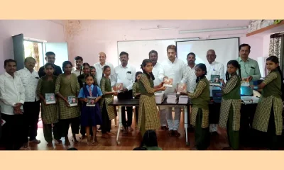Free note book distribution to government school students at Gangavathi