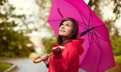 No Rain Girl waiting For rain and holding Umbrella