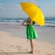 Girl in beach with Umbrella