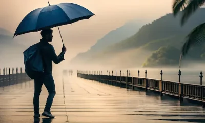 Boy holding Umbrella