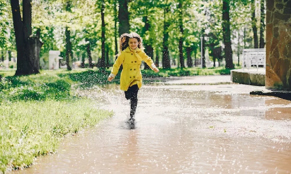 Girl running in rain