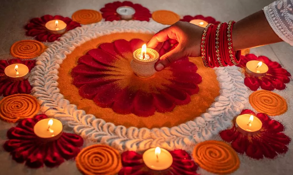 Rangoli Flower with Candles on Floor