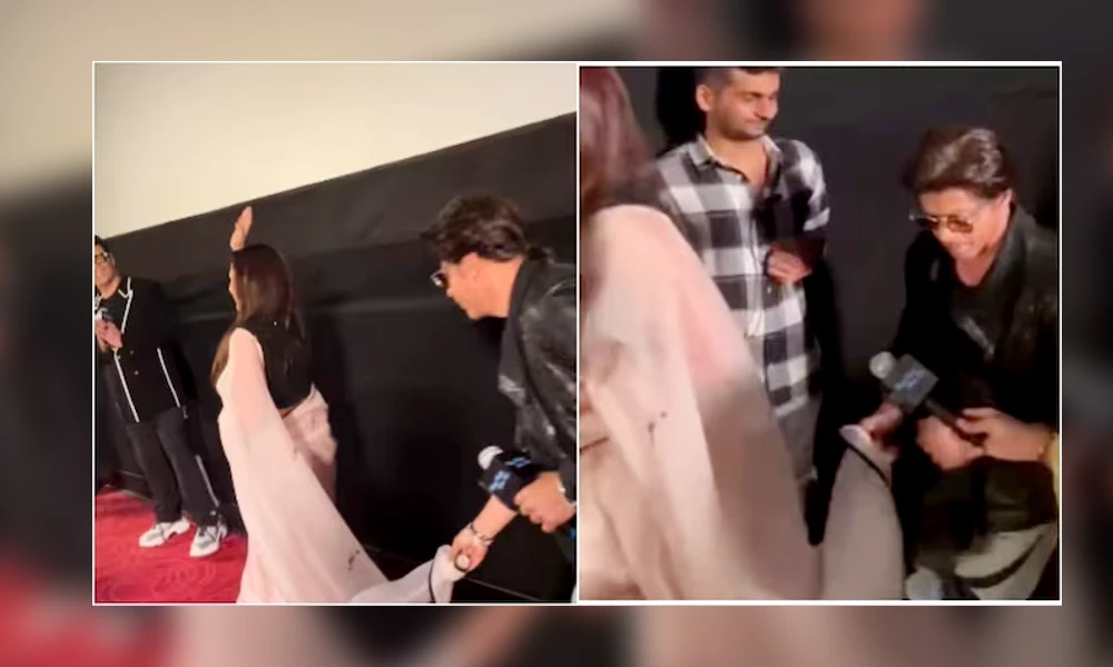 Shah Rukh Khan holds Rani pallu