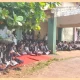 Silent protest by students demanding transfer of principal in Yallapura