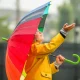 Boy Holding Umbrella