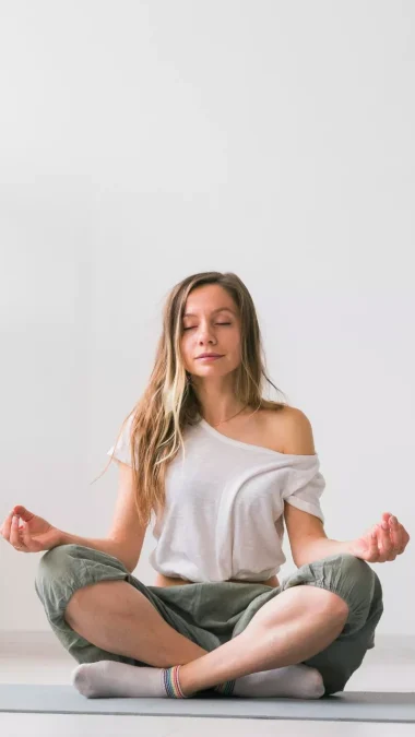 Young Woman in the Lotus Position While Meditating Mindfulness Practice Well-Being and Self-Concept Brain Exercises To Improve Memory