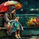 A girl reading a book in the rain