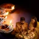 Family Lighting Candles at Home for Diwali
