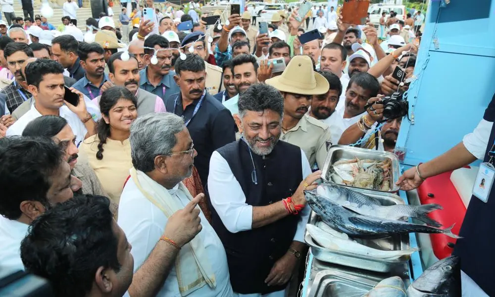 Fish delevery vehical and CM Siddaramaiah with DK Shivakumar