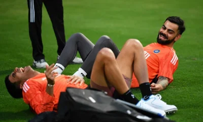 Virat Kohli and Shubman Gill share a light moment during India's practice session