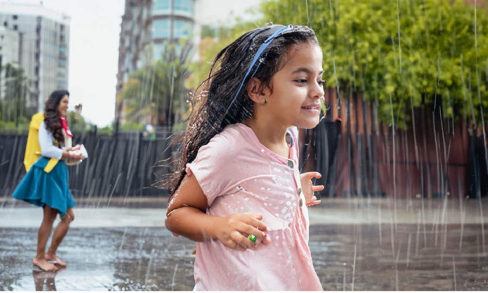 Girl plying in Rain