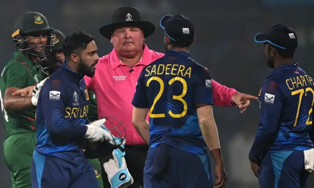 Umpire Marais Erasmus tries to diffuse the tension between the Sri Lankan and Bangladeshi players