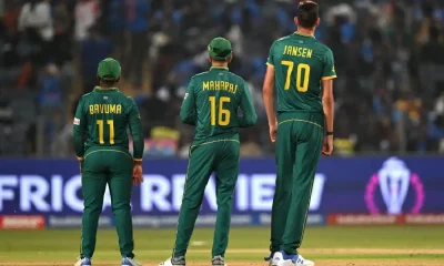 Temba Bavuma, Keshav Maharaj and Marco Jansen watch the replay of James Neesham's wicket