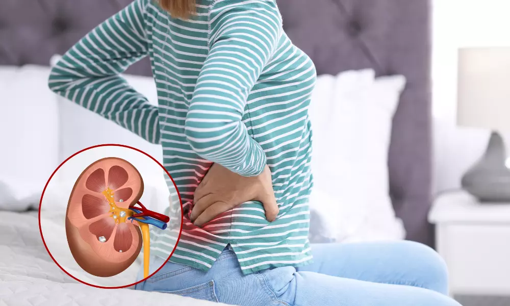 Young Woman Suffering from Back Pain at Home, Closeup