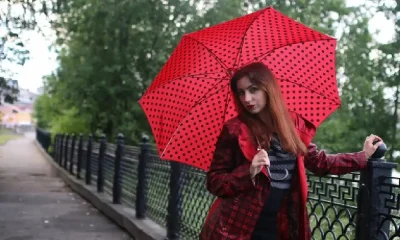 woman with umbrella on street