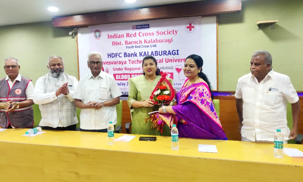 DC B Fauzia Tarannum was felicitated at a blood donation camp held at VTU Regional Center in Kalaburagi