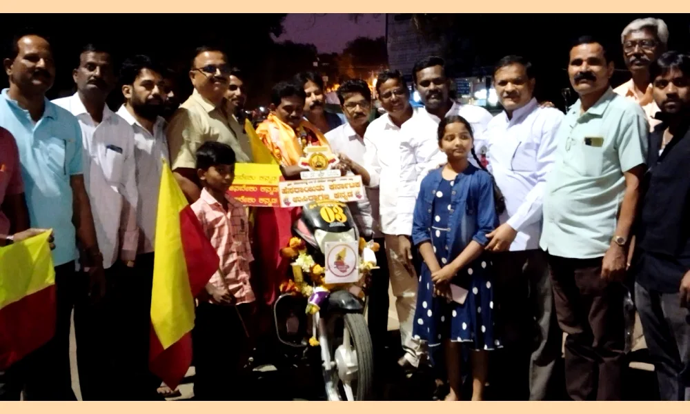 Kannada Awareness by Eranna Kundaragimath on Handleless Bike