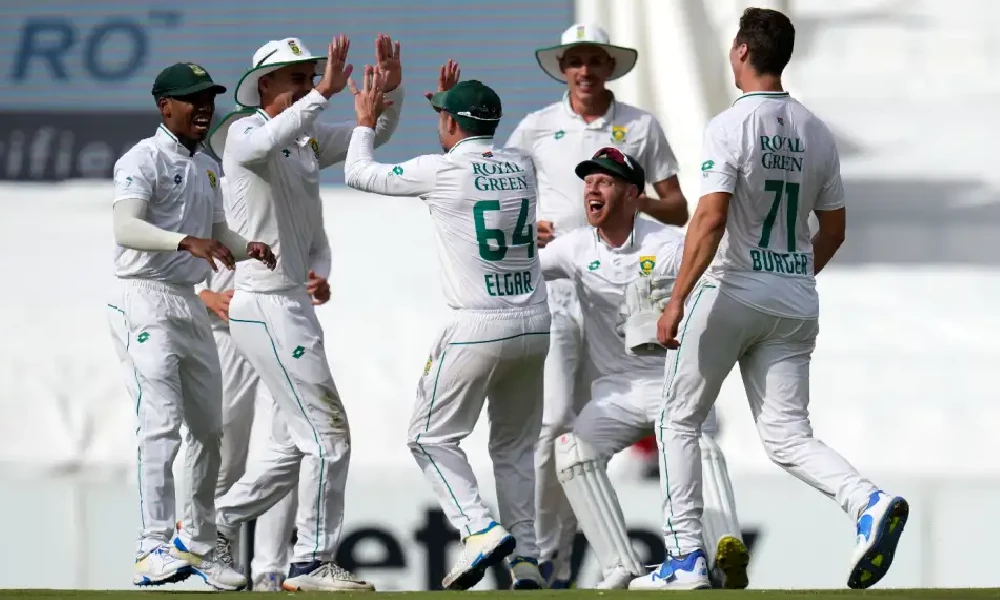 A thrilled South African unit celebrates with David Bedingham after he catches R Ashwin out for a duck