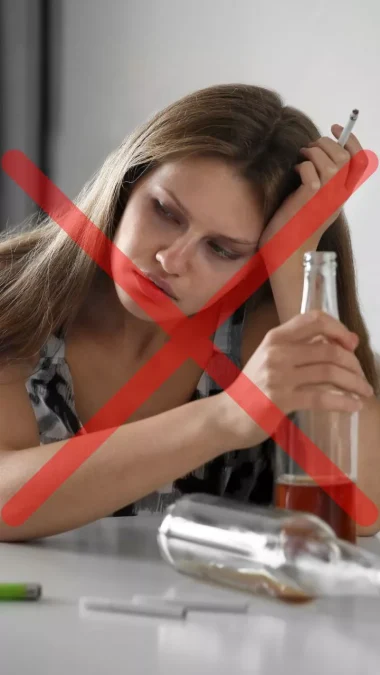 Young Woman Drinking Alcohol and Smoking Cigarette at Home Diabetes Control