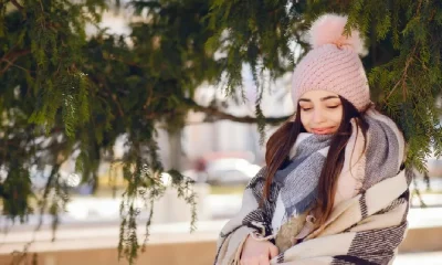 happy girl in a winter city