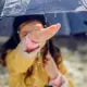 Girl Enjoying Rain