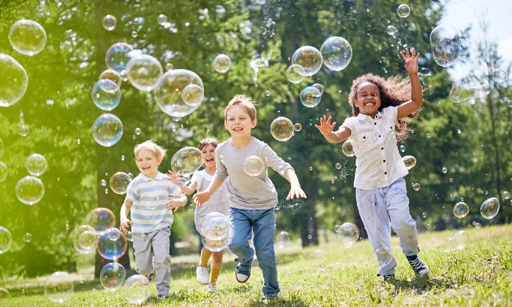 Raja Marga Column children playing bubles