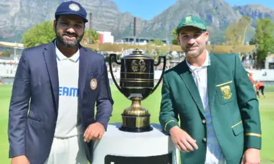 Rohit Sharma and Dean Elgar pose with the Freedom Trophy