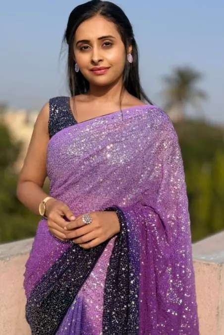 Sanjana Burli in purple sequins saree