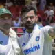 Virat Kohli with Dean Elgar during the latter’s last Test match