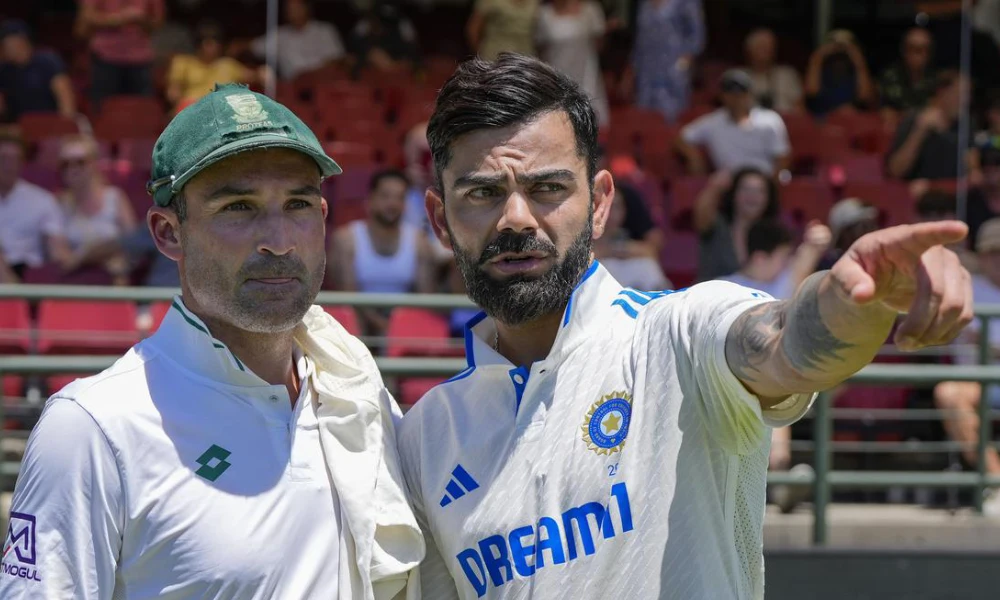 Virat Kohli with Dean Elgar during the latter’s last Test match