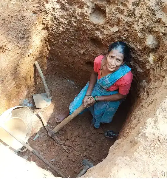 A woman started digging a well to solve the lack of water for Anganwadi children