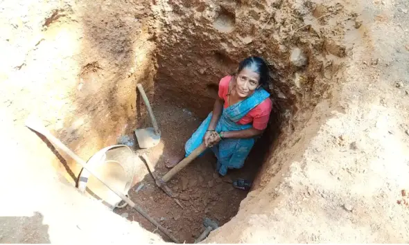 A woman started digging a well to solve the lack of water for Anganwadi children