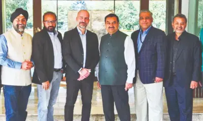 Adani Group- Uber talks for electric passenger cars in India