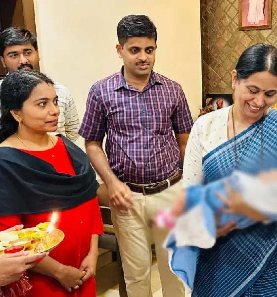 child adoption Minister Lakshmi Hebbalkar hands over baby to Kerala couple