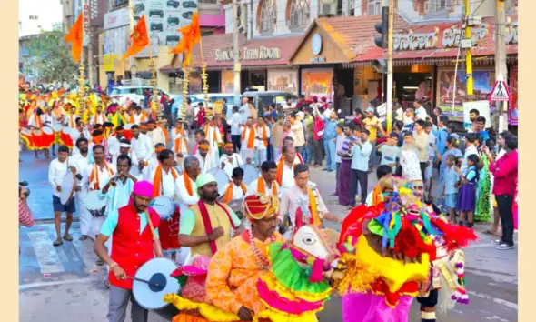 Hampi utsav MLA H R Gaviyappa drives for the Vasanta vaibhava procession