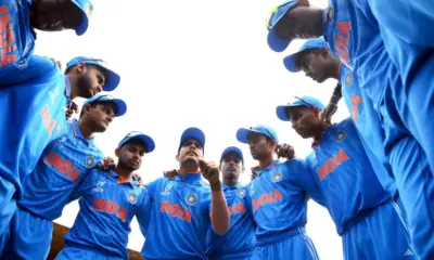 The Indian players get into a huddle