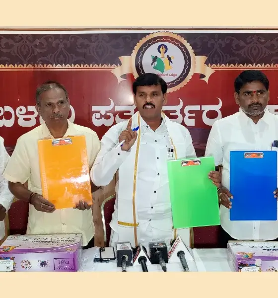 Distribution of examination pad and pen to 10th class students of Govt High School says Joladarashi Thimmappa