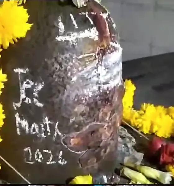 Someone wrote with a chalk piece on the Shivalinga idol of Someshwara temple