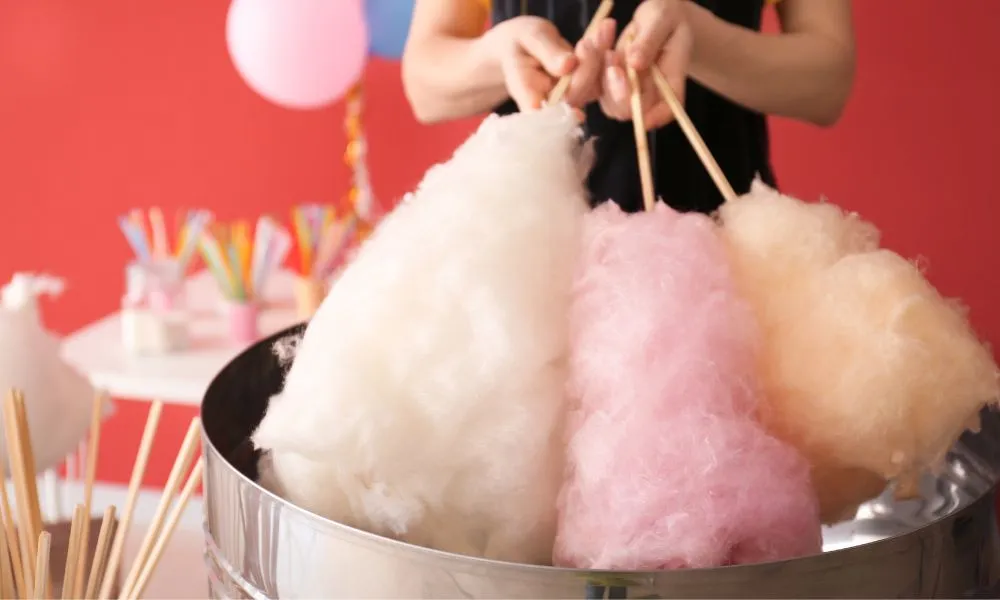 Woman Making Cotton Candy at Fair
