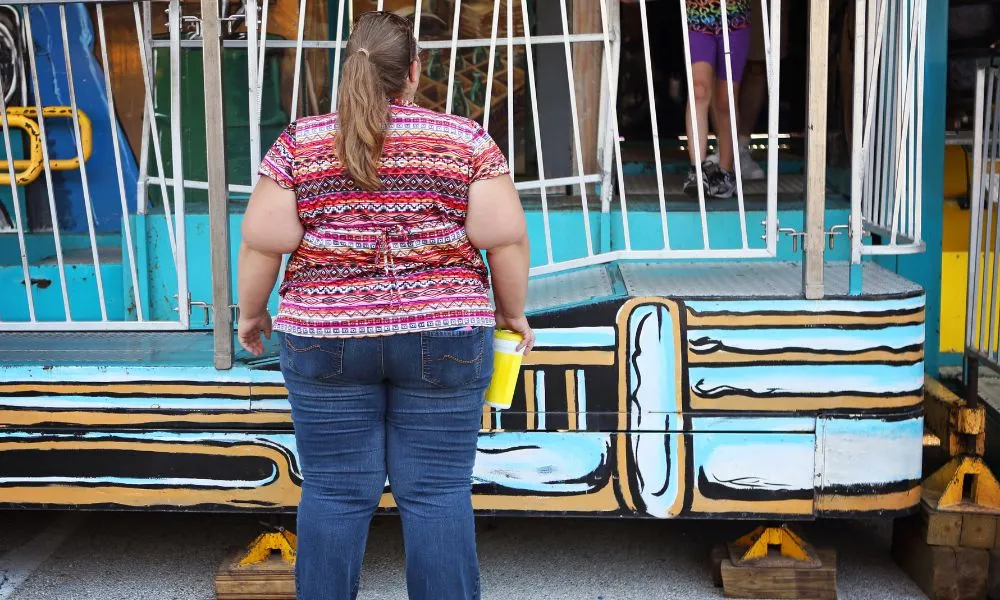 Woman Standing at a Carnival