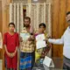 Ration Card Officials who gave new ration card to poor Family