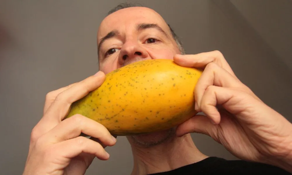 eating mango