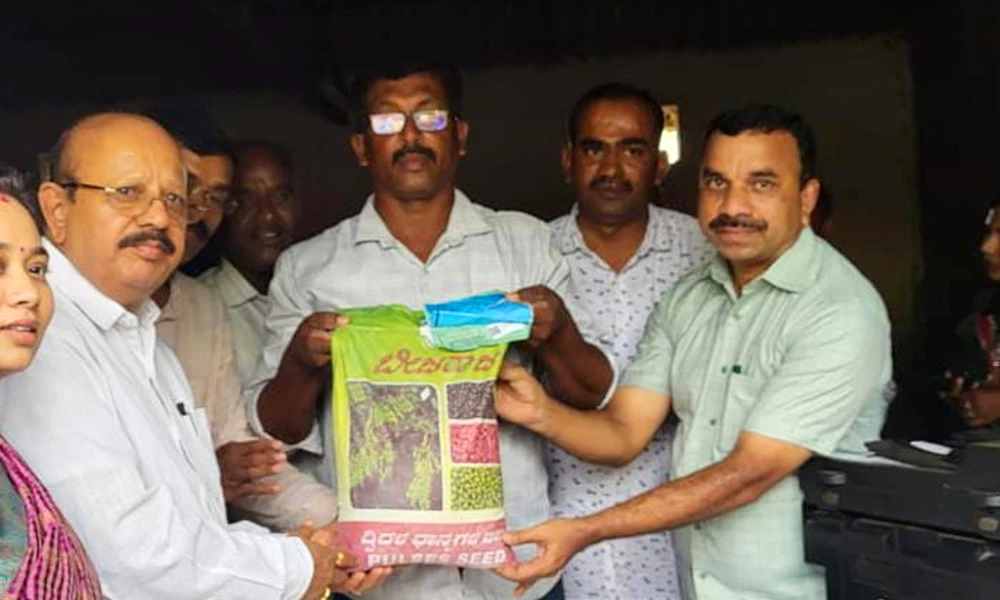 Sowing seed distribution in Shira by MLA TB Jayachandra